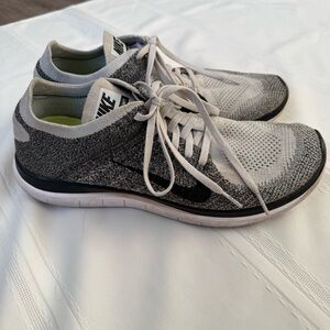 Nike Men's Black and White FlyKnit 4.0 Sneakers